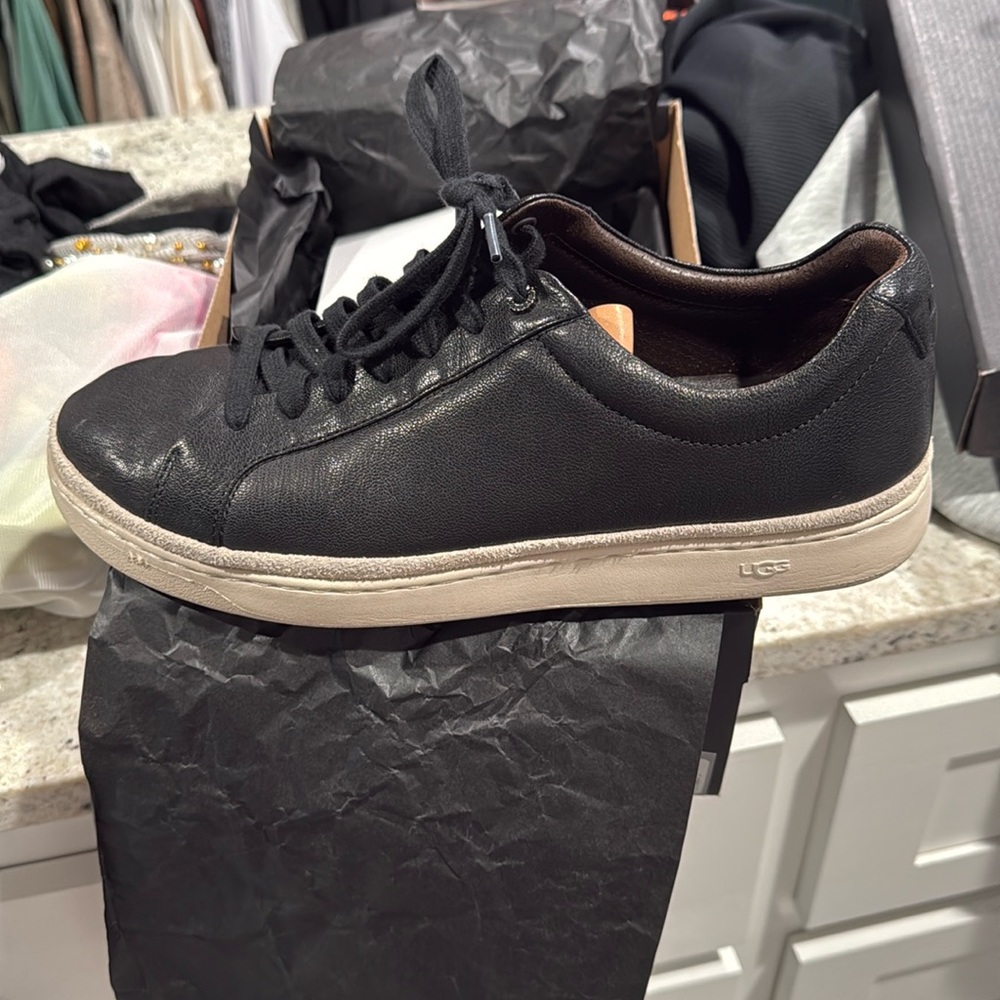 Black leather Ugg casual shoes. Extremely comfortable and barely worn